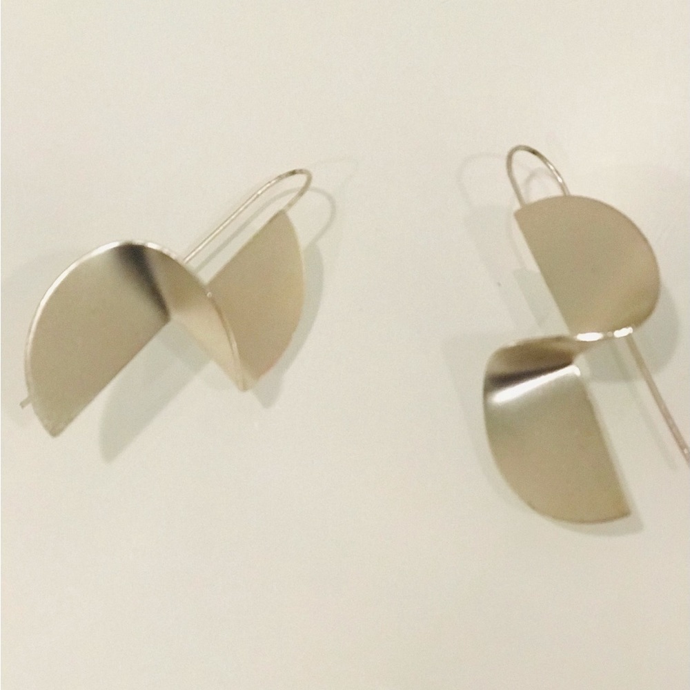 Boutique Silver Earrings With a Twist